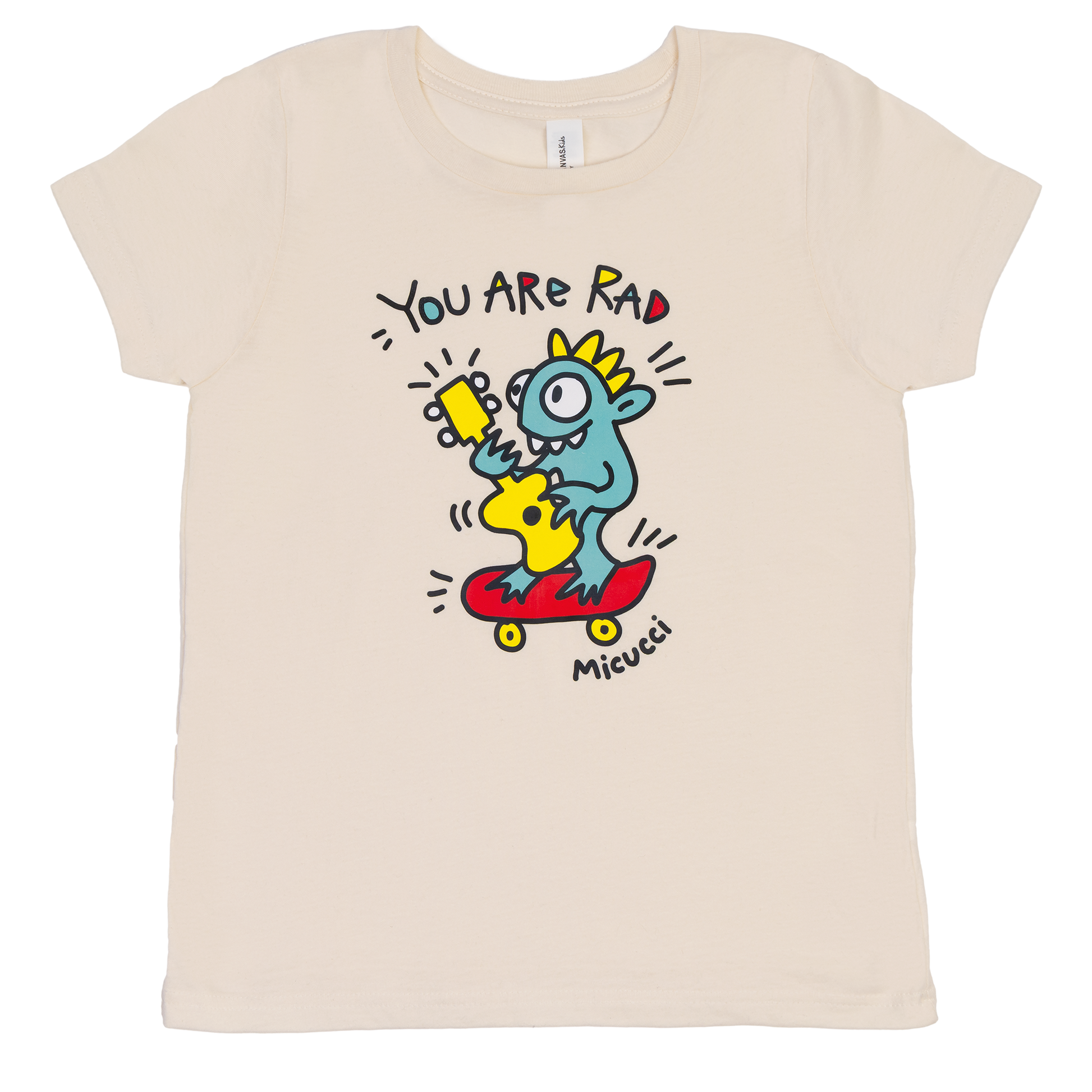 Beige t-shirt with a colorful graphic of a cartoon character and text on a white background